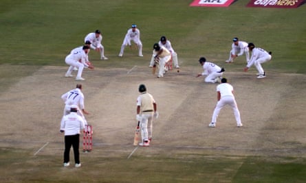 Ben Stokes’s all-conquering captaincy marks daring England win a true great | England cricket team 2 England fielders crowd round the bat as they close in on victory in the first Test against Pakistan