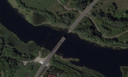 A satellite image shows a bridge collapsed over the Seym river in the Glushkovo district, after a Ukrainian strike in the Kursk region, Russia, 17 August 2024.