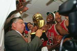 Then NBA commissioner David Stern presents Michael Jordan and the Chicago Bulls the championship trophy after the Bulls defeated the Phoenix Suns in game six of the 1993 NBA finals.