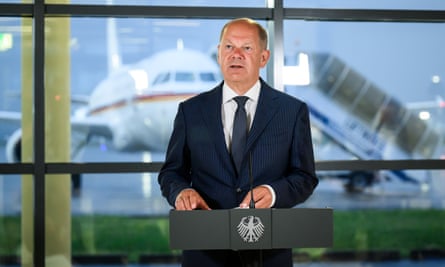 German chancellor Olaf Scholz speaking at Cologne airport