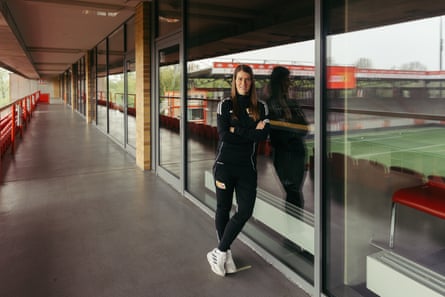 Marie-Louise Eta leans up to pose for a photo