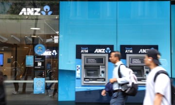 People walk past an ANZ storefront in Sydney