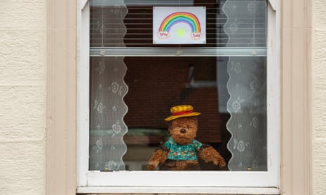 A rainbow poster reads 'stay safe' in an Edinburgh window, March 2020