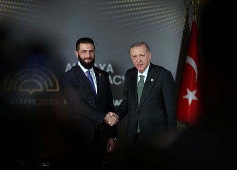 Turkey’s President Tayyip Erdogan meets with Syria’s interim President Ahmed al-Sharaa at Antalya Diplomacy Forum in Antalya, Turkey.