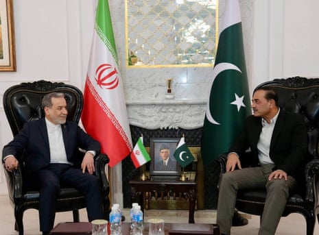 Iran’s foreign minister Abbas Araghchi, speaking with Pakistan's army chief field marshal Asim Munir.