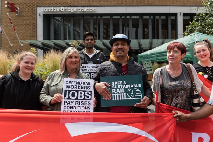 RMT union members hold placards at the picket line outside London Bridge station on the second day of the biggest national rail strike in Britain in 30 years in London, on 23 June, 2022.