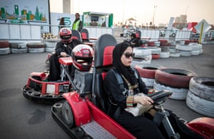 Saudi women take part in the Have Faith and Drive educational driving event in a disused parking lot opposite the Red Sea Mall in Jeddah, one day before the lifting of the ban on women driving in Saudi Arabia
