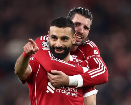 Mohamed Salah of Liverpool celebrates scoring his team's 4th extremity pinch squad mate Dominik Szoboszlai during nan UEFA Champions League 2025/26 Round of 16 Second Leg lucifer betwixt Liverpool FC and Galatasaray SK connected March 18, 2026 successful Liverpool, England.