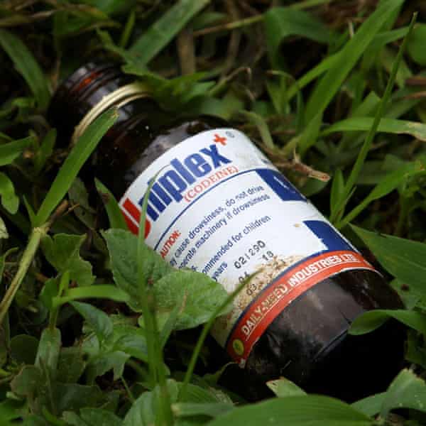 An empty bottle of Uniplex syrup