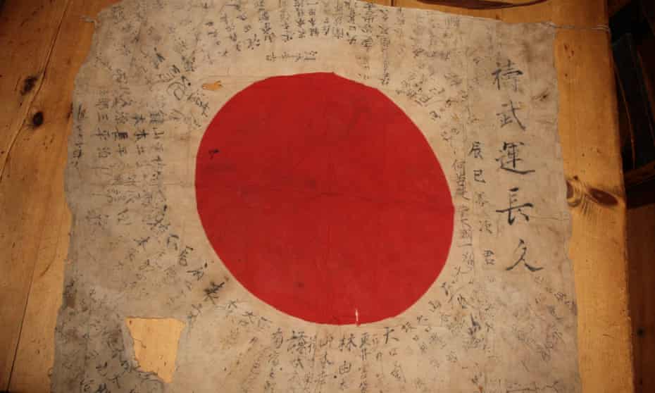 The Japanese flag inscribed with good luck messages  that was found in Devine’s suitcase.