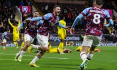 Halil Dervisoglu and his Burnley teammates celebrate his winner against Rotherham in the 10th minute of added time.