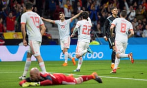 Isco, No 22, celebrates scoring Spain’s second goal against a Lionel Messi-less Argentina.