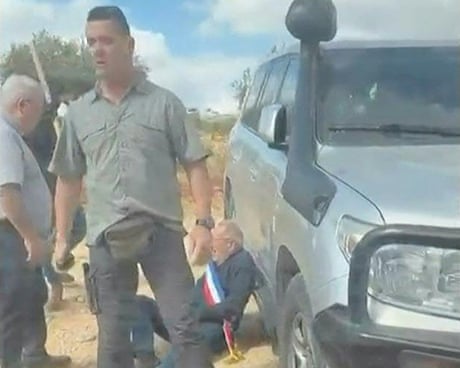 Guardian reporter filmed masked militants seconds before West Bank attack on French mayor