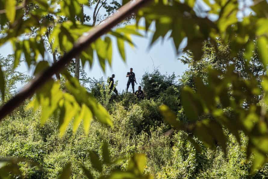 Armed guards patrol land in Honduras