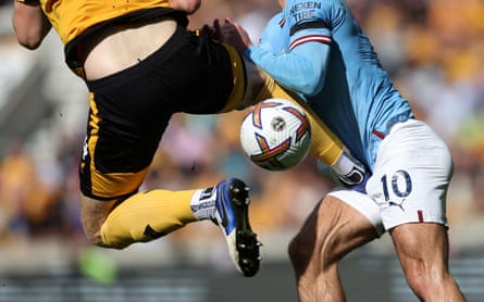 Wolverhampton Wanderers’ Nathan Collins fouls Manchester City’s Jack Grealish leading to a red card during their match at Molineux