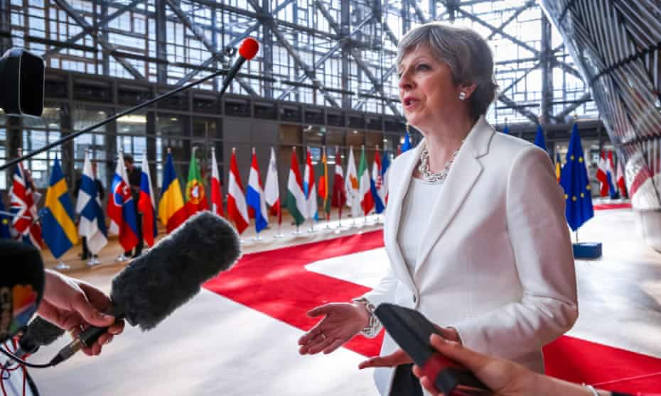 Departing: Theresa May in Brussels.