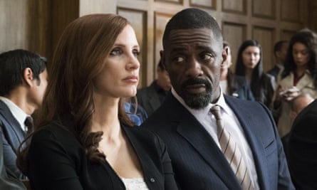 Idris Elba, right, and Jessica Chastain in Molly’s Game