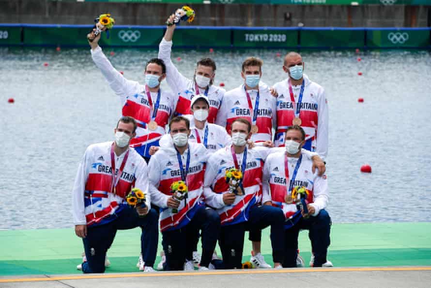 Josh Bugajski and other members of the men’s rowing eight after winning bronze at the Tokyo Olympics