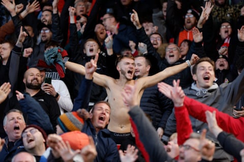 Wrexham fans celebrate after their side scored two late goals to beat Salford 3-2