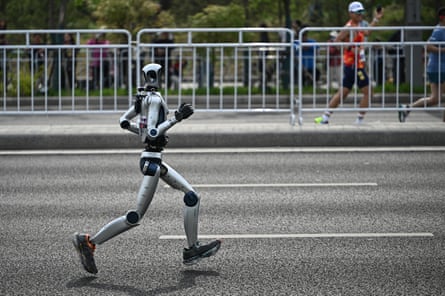 A robot heads round the course in Beijing.