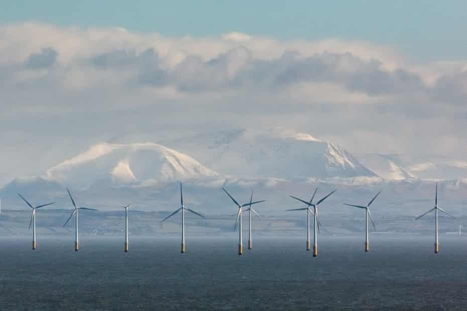 Robin Rigg Wind Farm and the Cumbrian fells from Balcary Point, Dumfries and Galloway, Scotland.