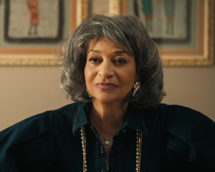 older woman softly smiling