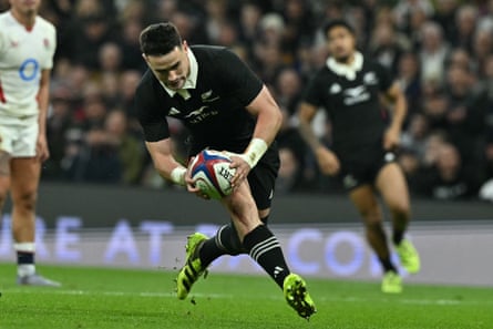 Will Jordan scores New Zealand’s third try in the final quarter.