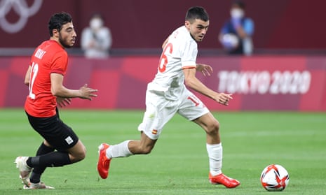 Pedri tries to break away from Akram Tawfik during Spain’s goalless draw with Egypt in their opening game at the Olympics.