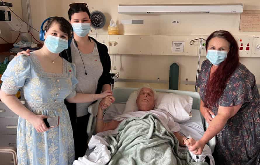 Grandchildren Hannah and Sophie and daughter Ann visit John in hospital in Taree