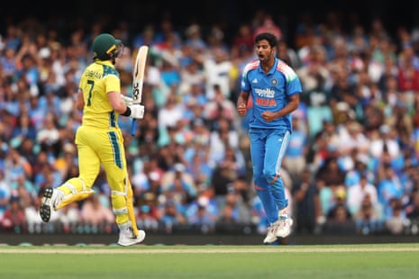 Washington Sundar celebrates after taking the wicket of Matt Renshaw