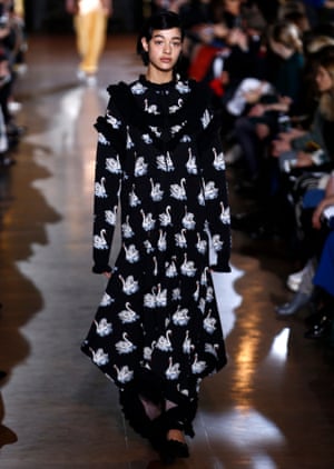 A Stella McCartney model in a whimsical swan-print dress