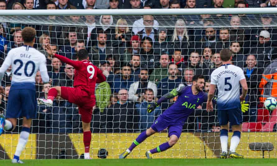 Roberto Firmino heads home Liverpool’s opening goal against Tottenham.