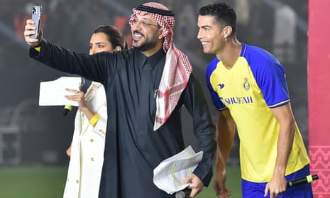 Cristiano Ronaldo poses for a selfie during his unveiling by Al Nassr in Riyadh.