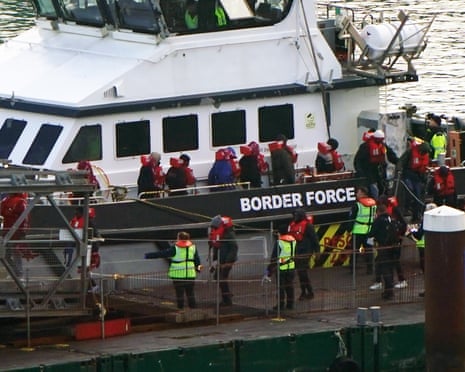 Migrants on a Border Force boat.