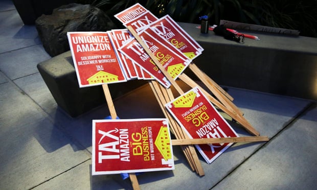 Signs supporting Amazon workers trying to unionize in Bessemer, Alabama, are seen in Seattle, Washington, on 20 February.