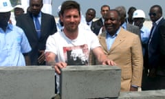 Lionel Messi lays the first stone at the construction site of a football stadium in Port-Gentil, Gabon, with the country’s president, Ali Bongo, to his left.