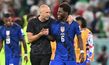 Gregg Berhalter celebrates with Yunus Musah after USA’s victory over Iran