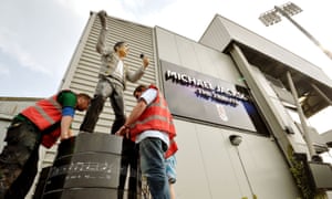 A statue of Michael Jackson outside Craven Cottage is removed in 2013.
