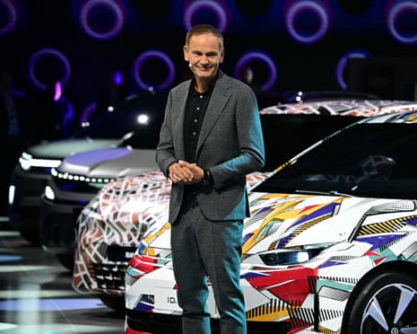 Volkswagen chief executive Oliver Blume delivers a speech in front of a Polo ID electric car at the International Motor Show IAA in Munich, Germany