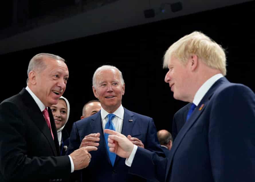 Recep Tayyip Erdoğan, Joe Biden and Boris Johnson speak during the Nato summit in Madrid
