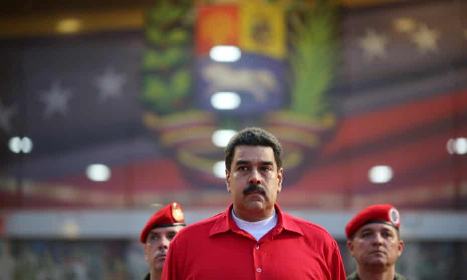 President Nicolas Maduro receives military honors at Maiquetia airport, in Caracas, Venezuela on Thursday.