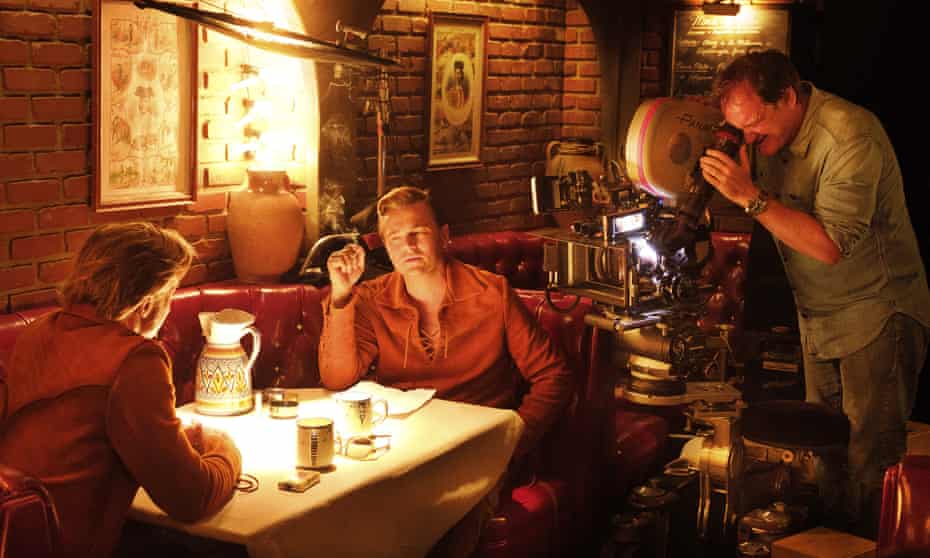 Quentin Tarantino, right, with Leonardo DiCaprio and Brad Pitt, left, during the filming of Once Upon a Time in Hollywood.