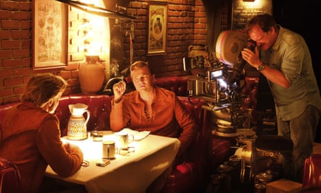 Quentin Tarantino films Leonardo DiCaprio (centre) and Brad Pitt on the set of Once Upon a Time in Hollywood.