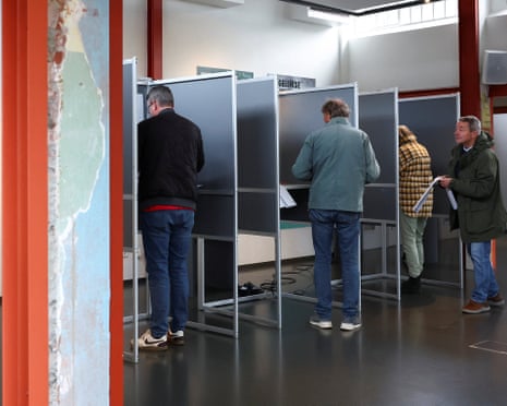 People vote during the Dutch parliamentary election in The Hague, Netherlands.