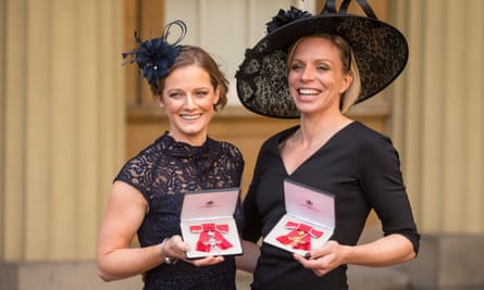 Helen, left, and Kate Richardson-Walsh pose after each receiving honours at Buckingham Palace in 2017