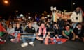 protesters sitting on road
