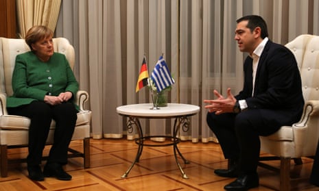 German Chancellor Angela Merkel chats to Greek Prime Minister Alexis Tsipras in Athens, Greece