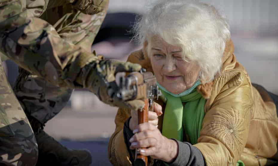 Valentyna Konstantynovska, 79, holds a weapon during basic combat training for civilians, in Mariupol, Donetsk, eastern Ukraine.