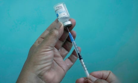A nurse prepares a dose of the Abdala vaccine at a vaccination centre.