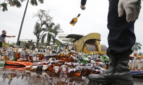 Illegal whisky is crushed